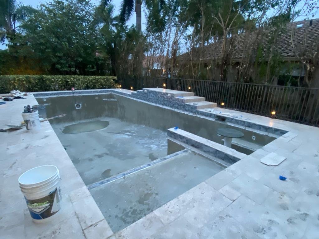 Pool shell mid-construction, plaster stage, before filling